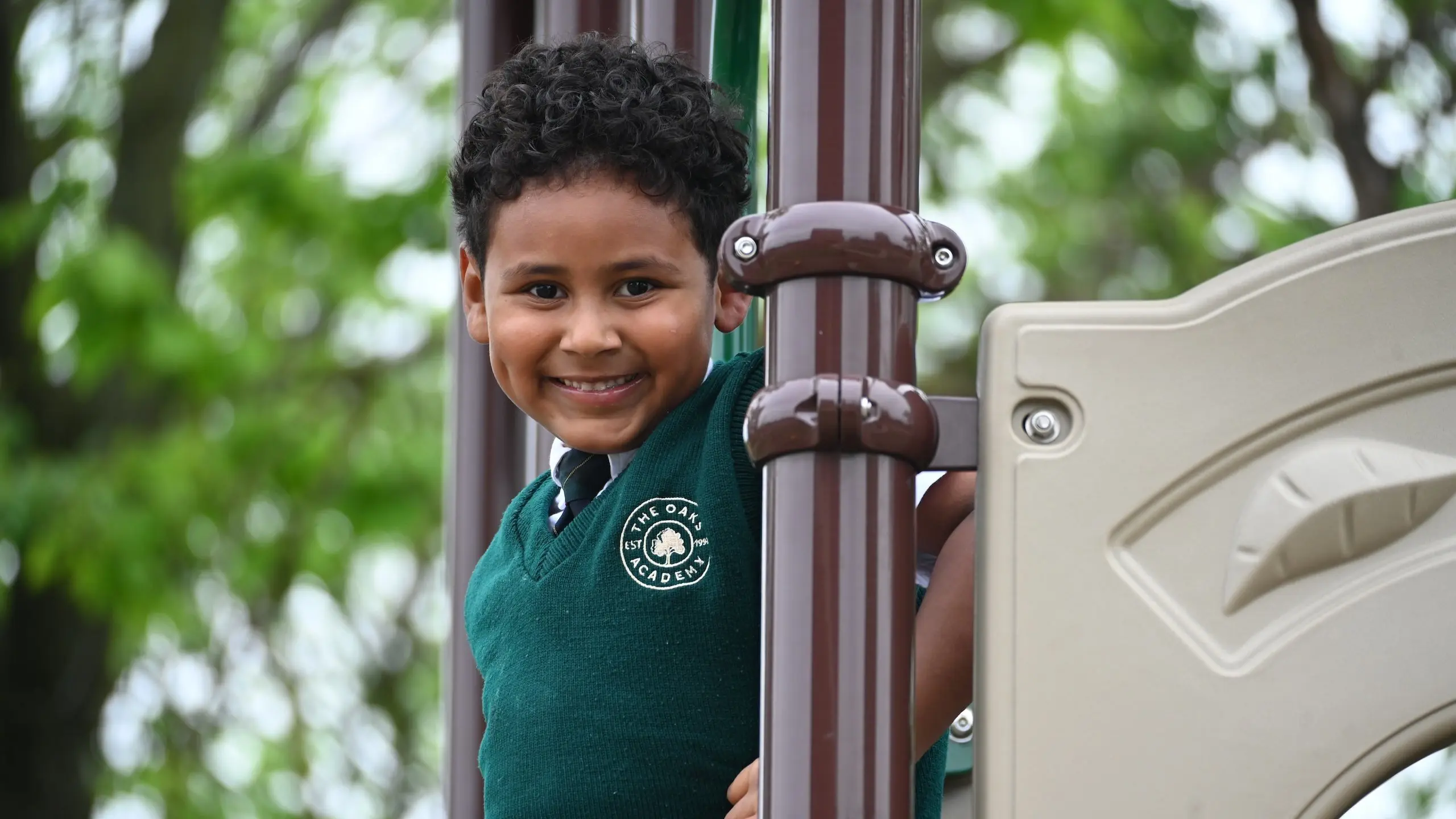  A student smiles on the playground